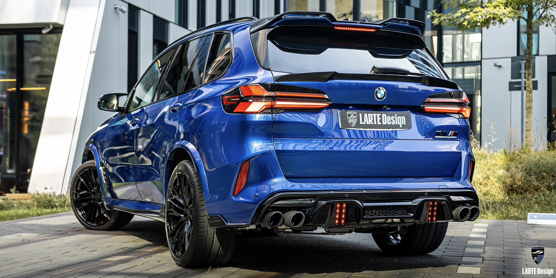 BMW X5M Facelift luxury car with Larte Performance spoilers, diffuser skirts, and forged rims.