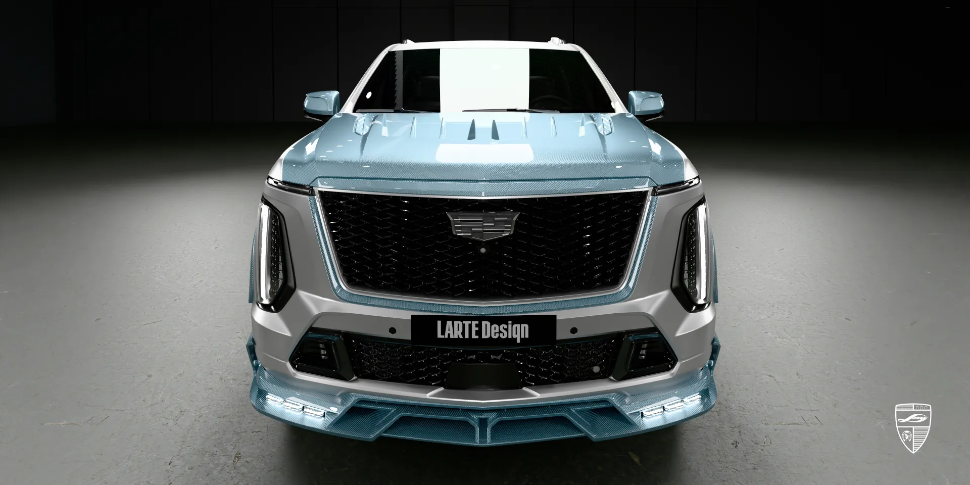 Front bumper kit on the pearl white Cadillac Escalade V, adding a commanding front‑end presence