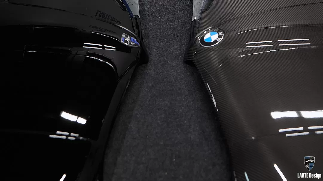 Two BMW hoods made from carbon fiber and composites – top-quality materials for body kits.