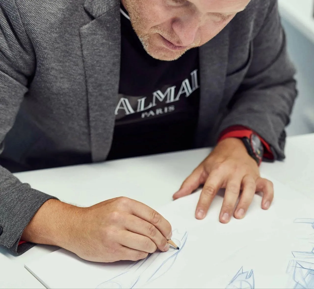 Famous automotive designer Brano Mauks sketching a concept for a future project