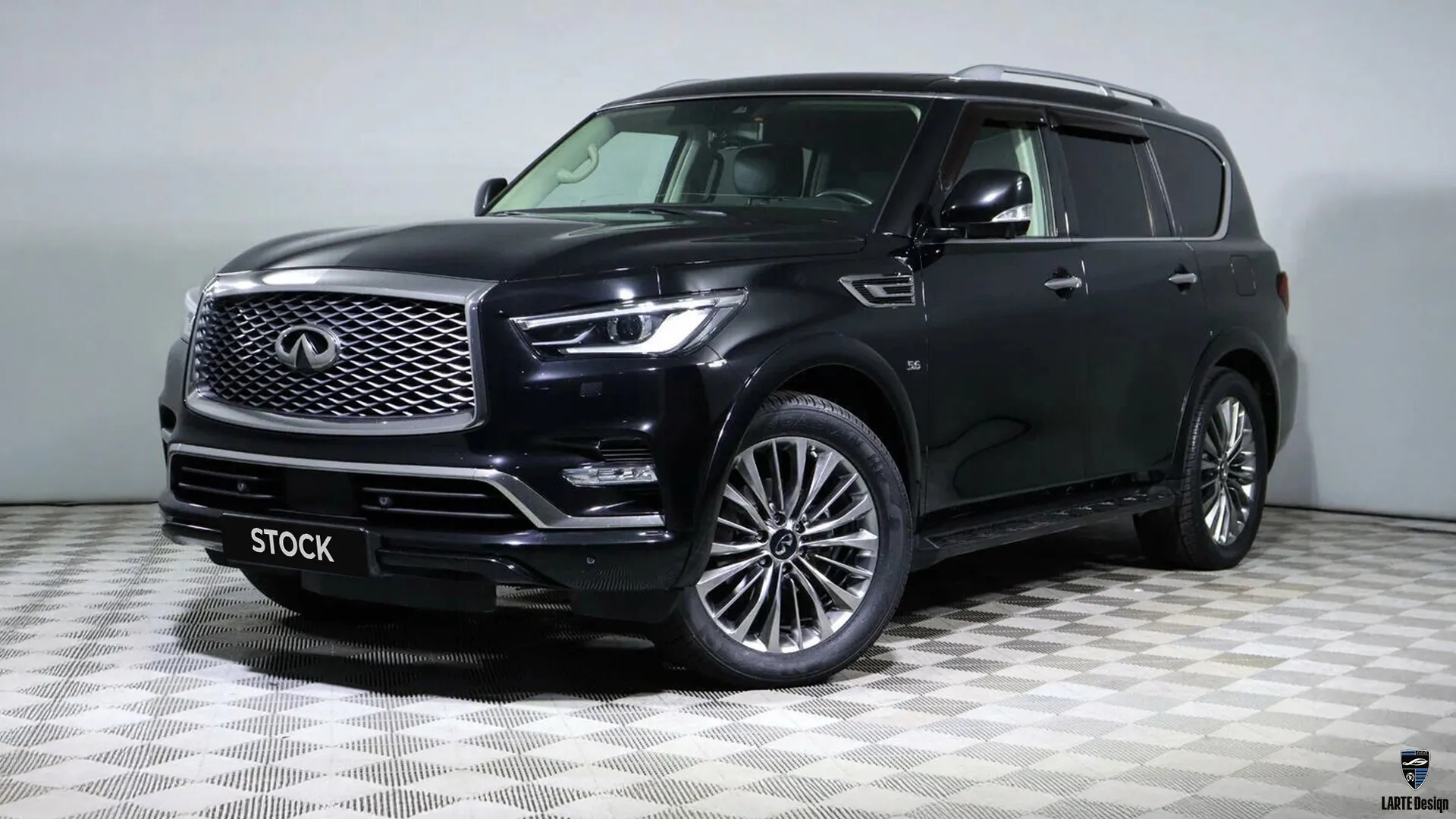 Comparison: Infiniti QX80 before upgrading with premium body kit.