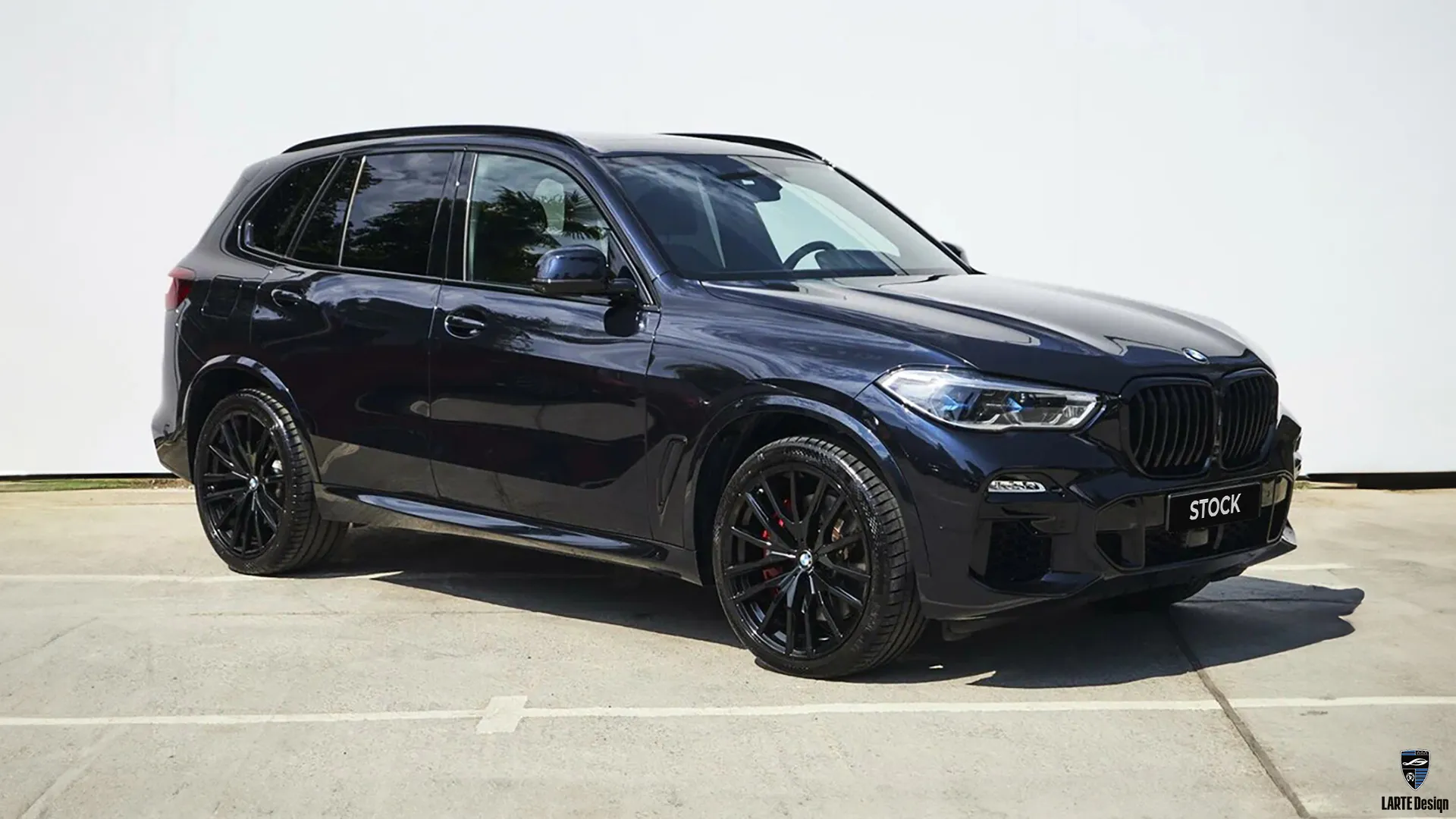 Comparison: BMW X5 before installing the limited edition tuning kit.