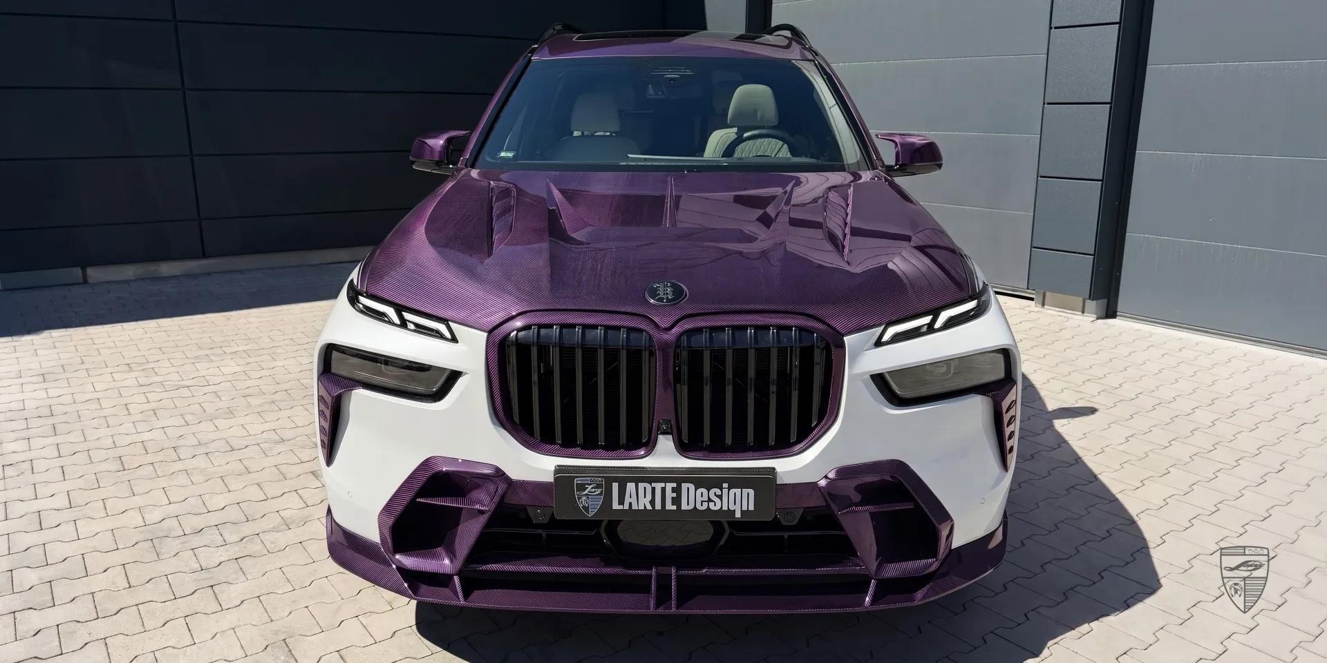 BMW X7 aggressive styling kit with splitter, hood, and assertive look