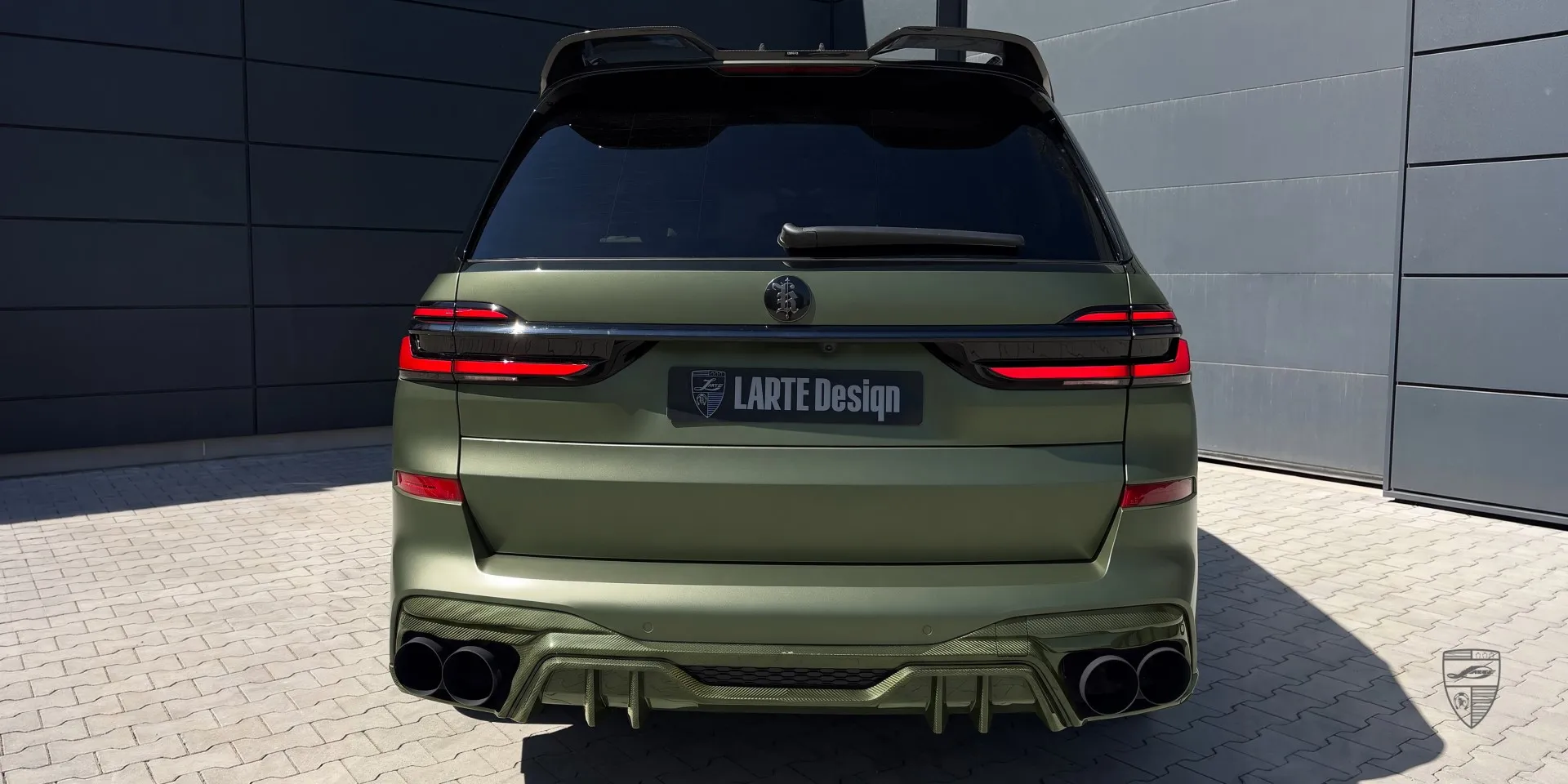 BMW X7 carbon fiber body kit with visible weave and performance styling