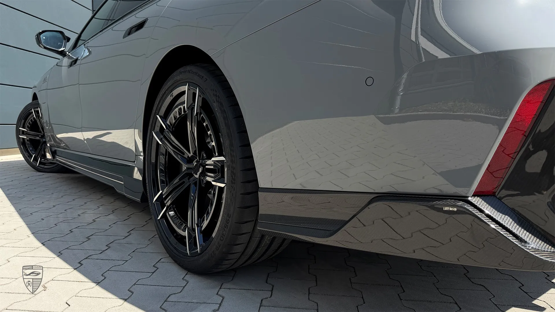 BMW 7 Series LCI styling with custom wheel detail and exterior upgrades