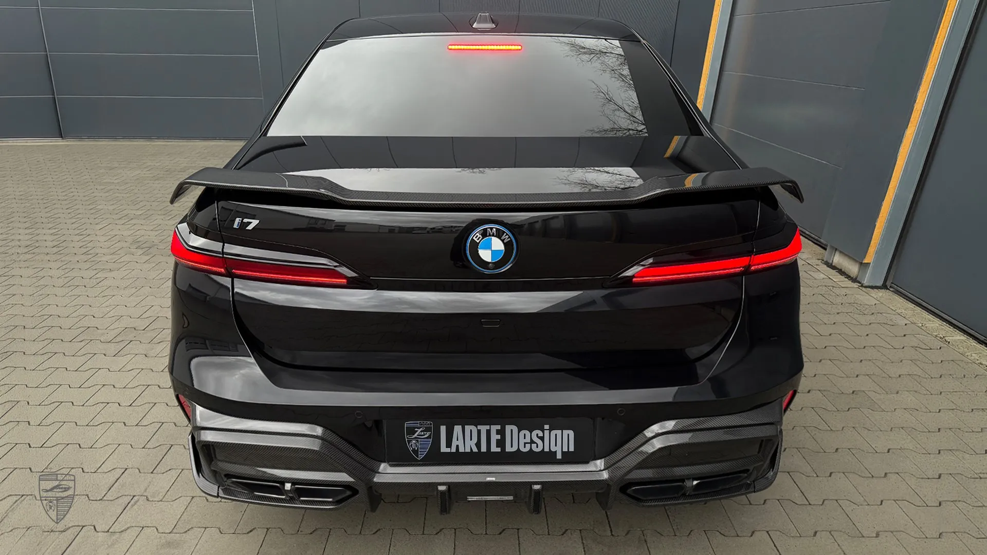 BMW i7 all electric 7 Series rear view with elegant luxury sedan design