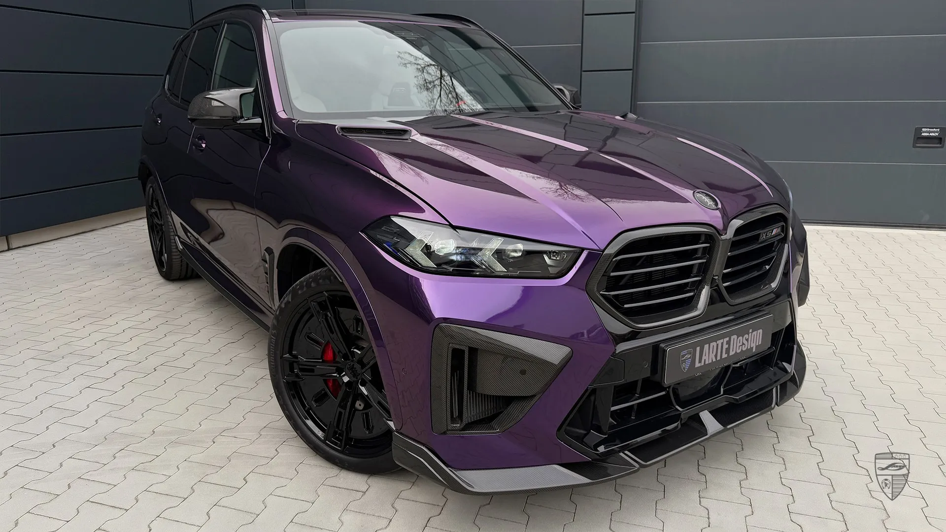 2025 BMW X5M with custom exterior styling and aggressive body kit details