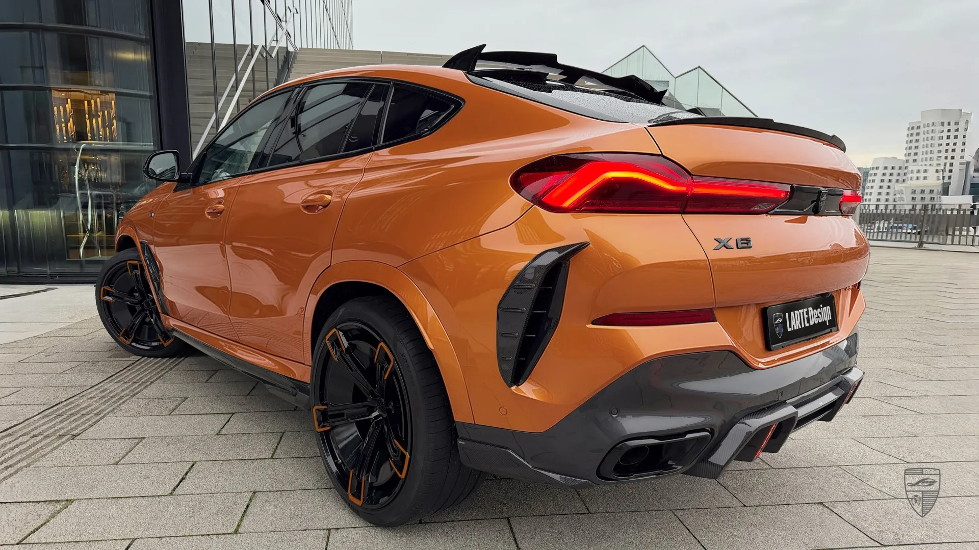 2024 BMW X6 Facelift in orange with custom aerodynamic kit
