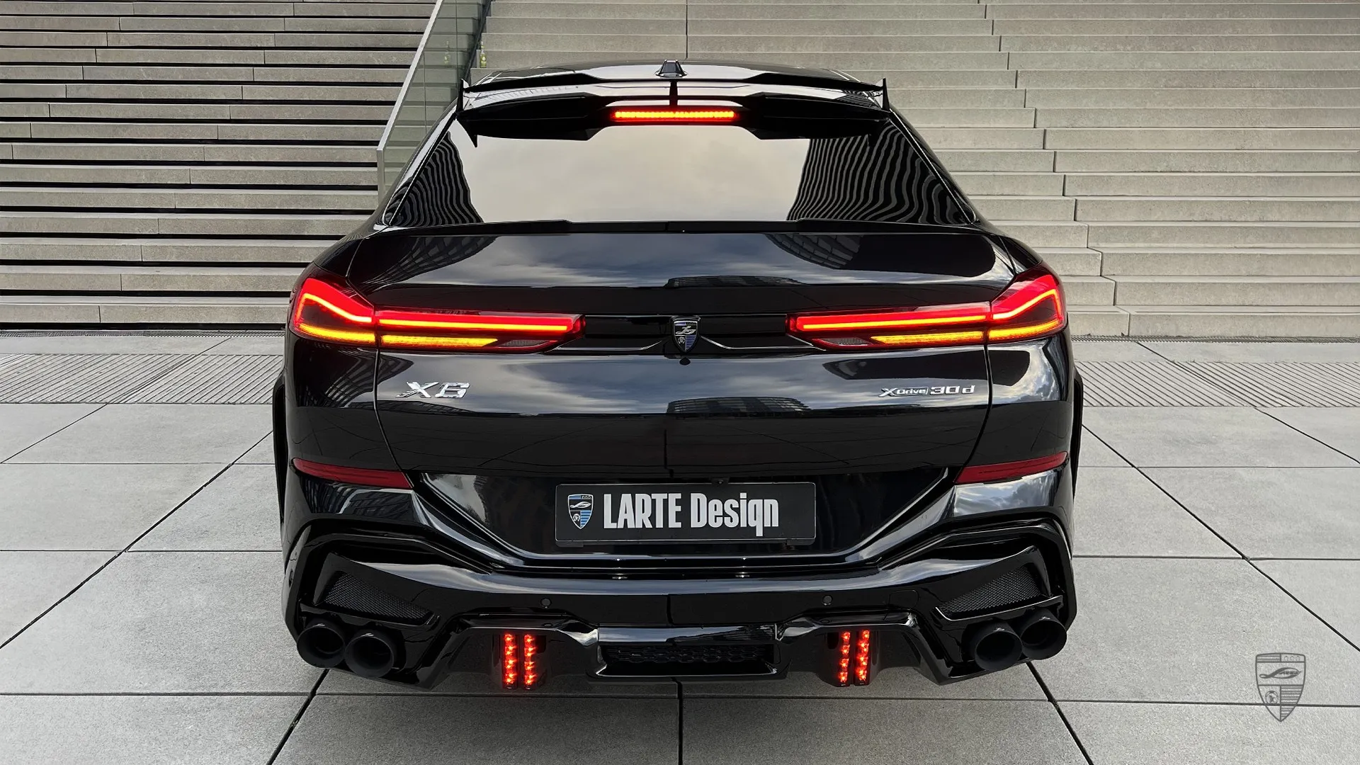 Black BMW X6 G06 with aggressive performance design