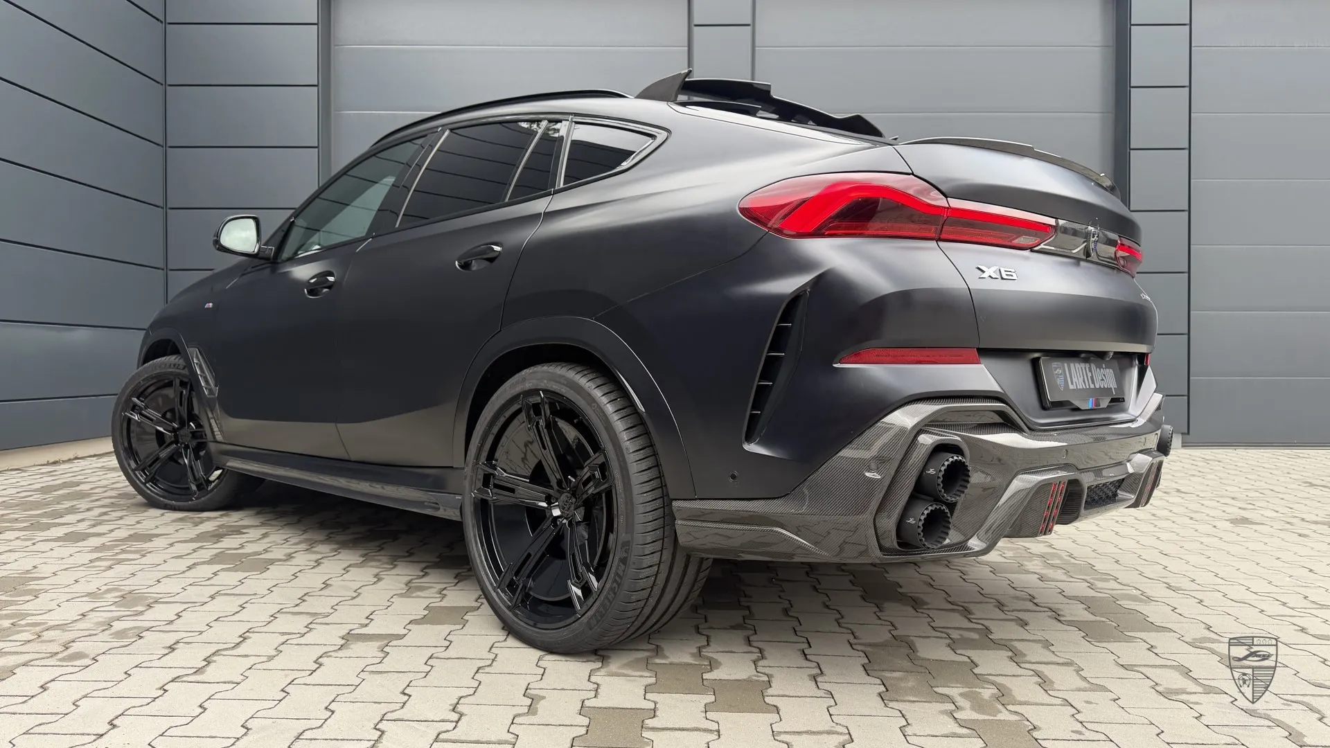 BMW X6 Facelift in matte black with modern body kit styling and custom exterior modifications