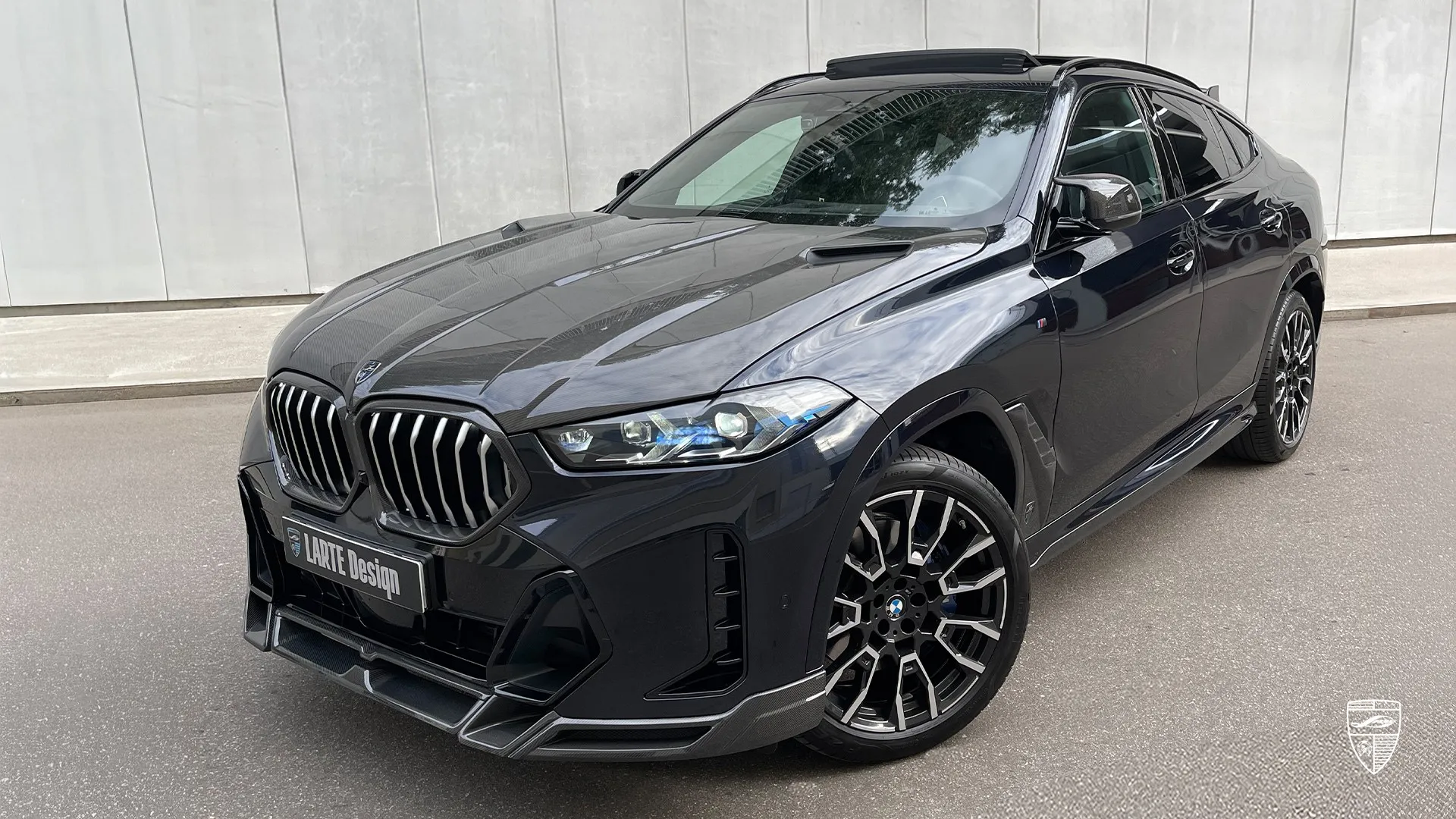 Facelifted BMW X6 G06 M40i in Carbon Black — custom upgrade SUV with bold visual impact