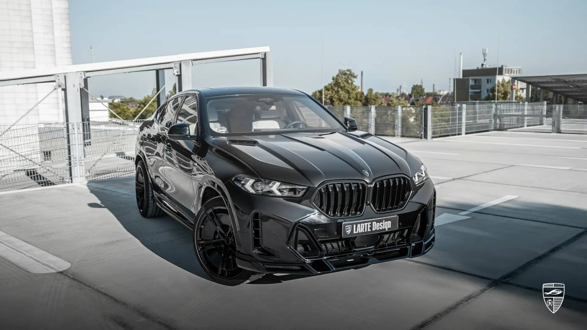 BMW X6 G06 Facelift LCI — Obsidian Black SUV with aggressive front fascia and tuning upgrade