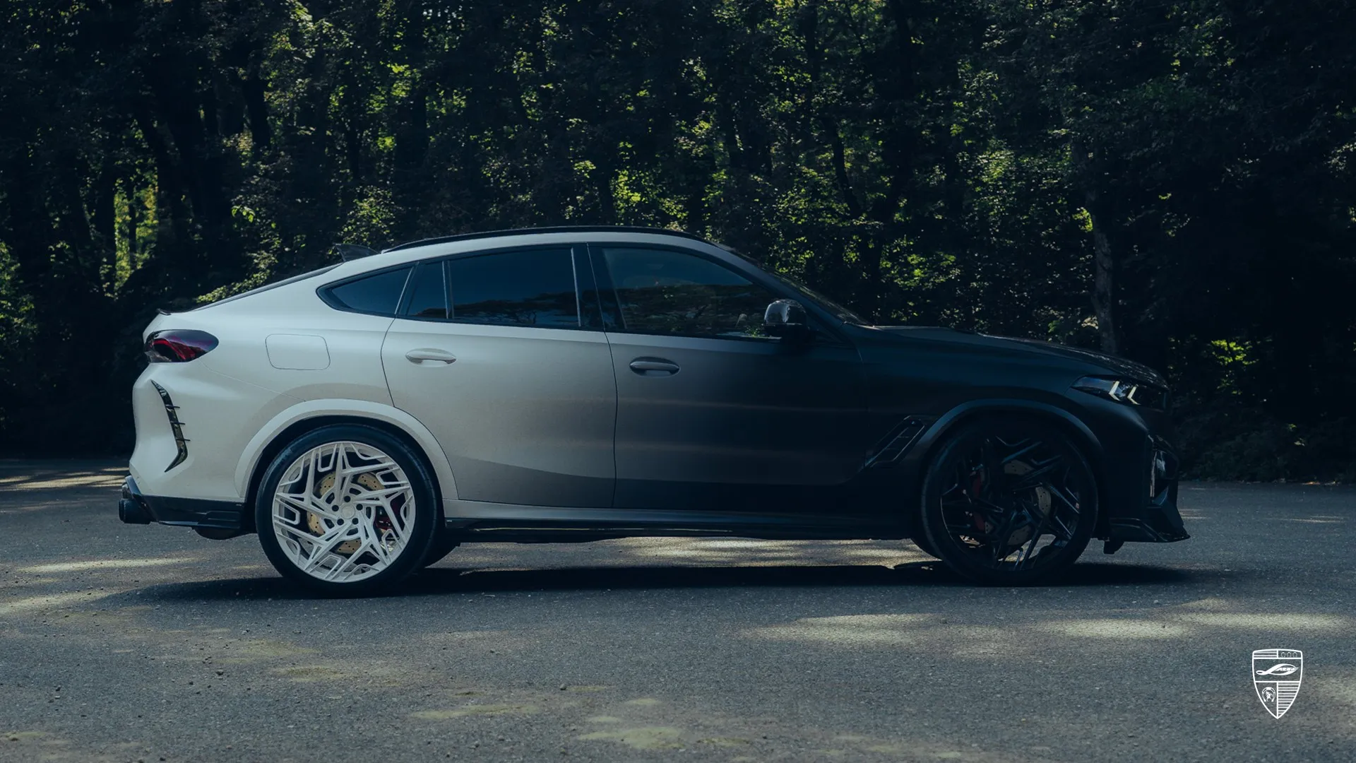 2026 BMW X6M side profile with custom styling and a clean coupe SUV look