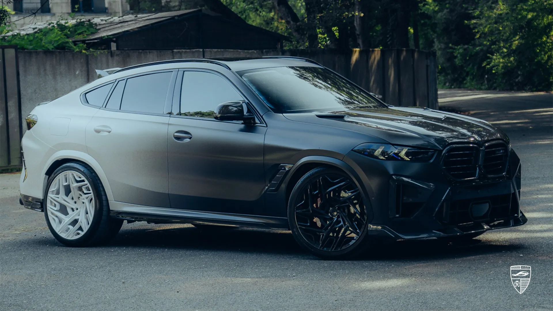 BMW X6M Competition LCI in dark finish with custom exterior styling and coupe SUV character
