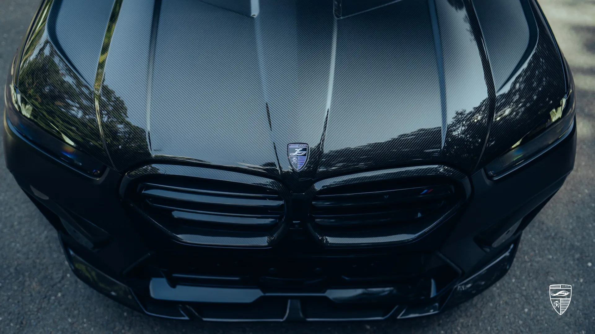 BMW X6M LCI hood and grille detail with bold custom exterior design