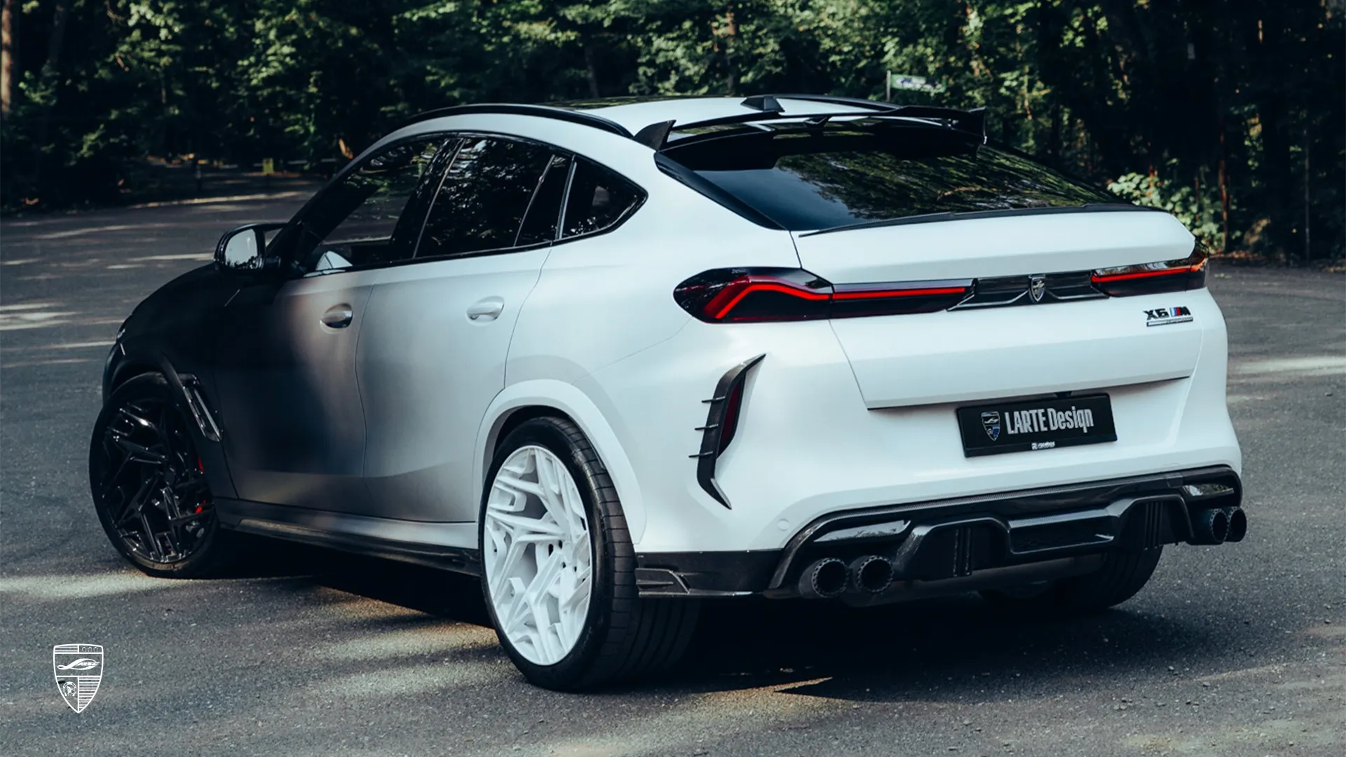 Custom BMW X6M LCI in rear three-quarter view with sporty exterior styling