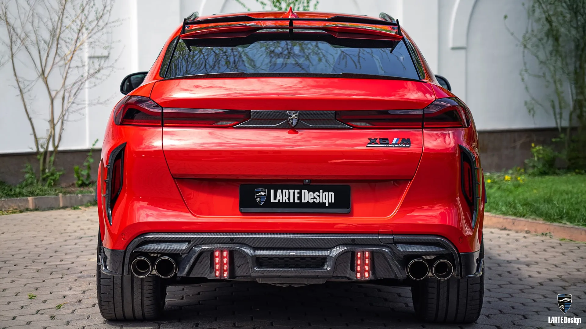 Tailored carbon body kit on Flamenco Red BMW X6M Competition F96 from Almaty — sporty SUV
