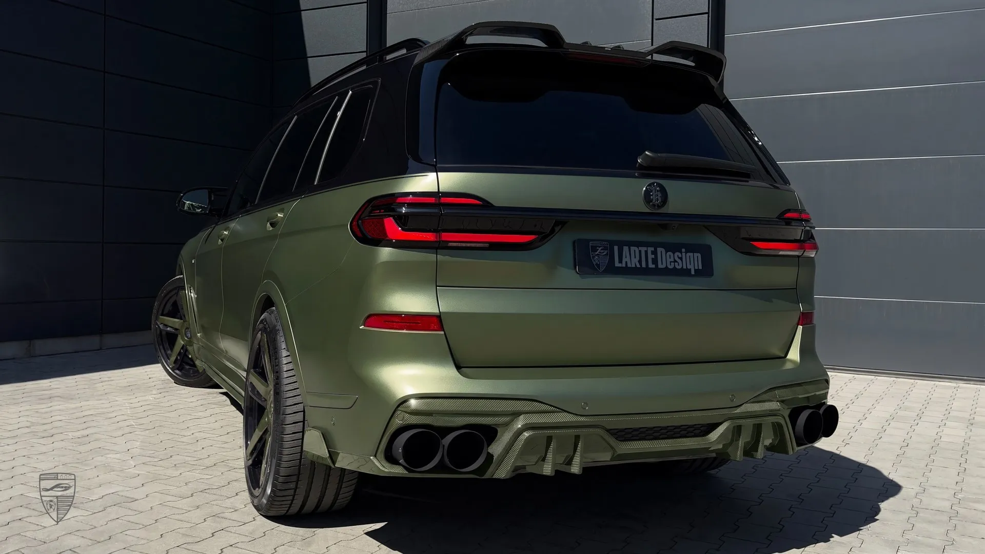BMW X7 with carbon shown in rear three-quarter view with custom exterior styling