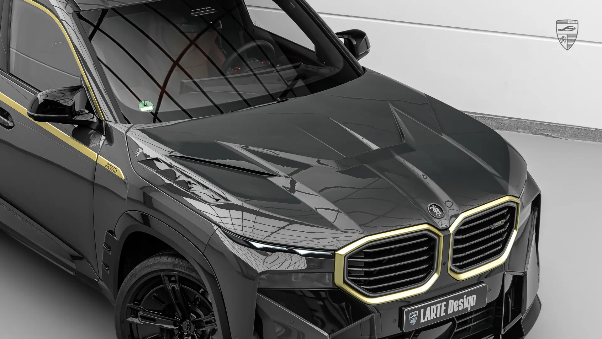 BMW XM custom design with sculpted hood styling and exclusive exterior details