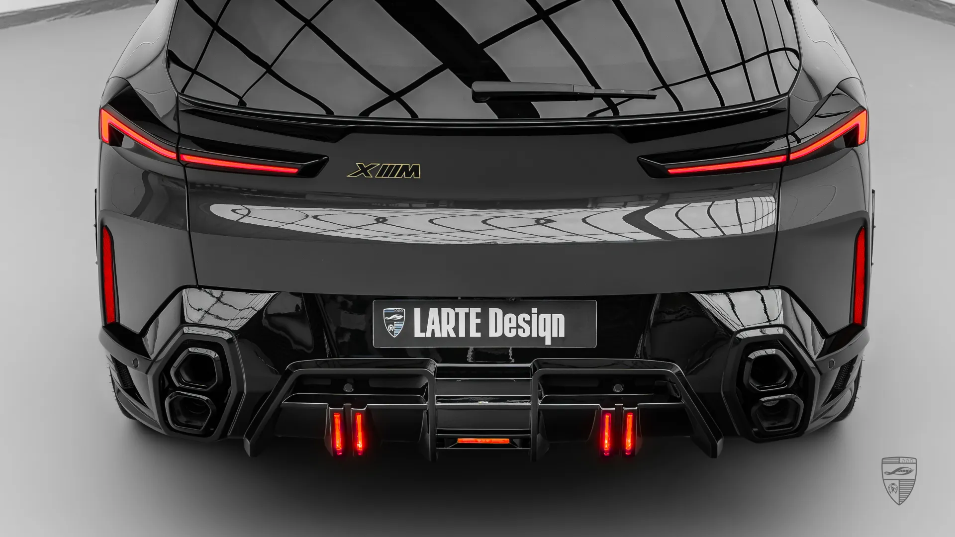 BMW XM exterior rear view with performance inspired styling and upgraded body kit elements