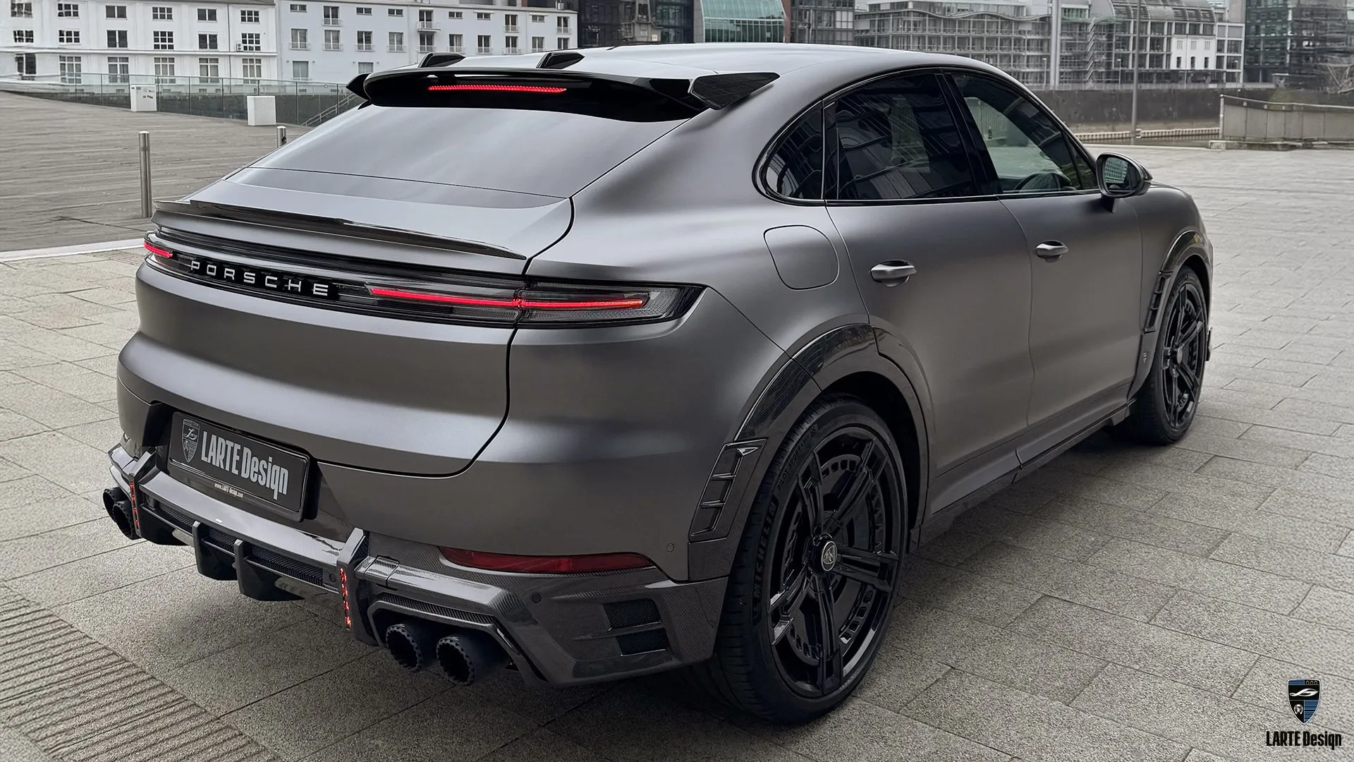 Custom Porsche Cayenne S – Grey SUV with Carbon Details 2026 Porsche Cayenne S Coupe — Satin Dark Grey SUV with carbon rear diffuser and hood vents