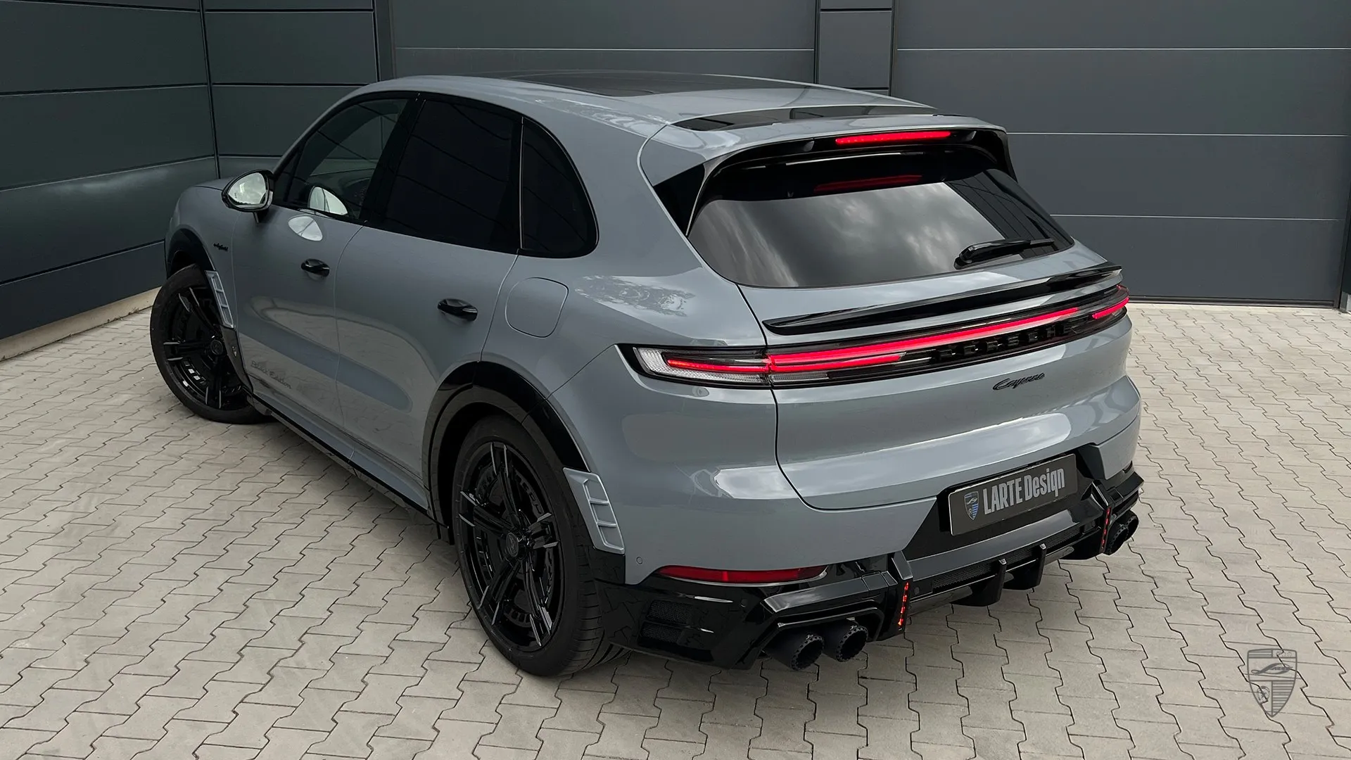 Porsche Cayenne Coupe exterior in Arctic Grey with refined custom styling