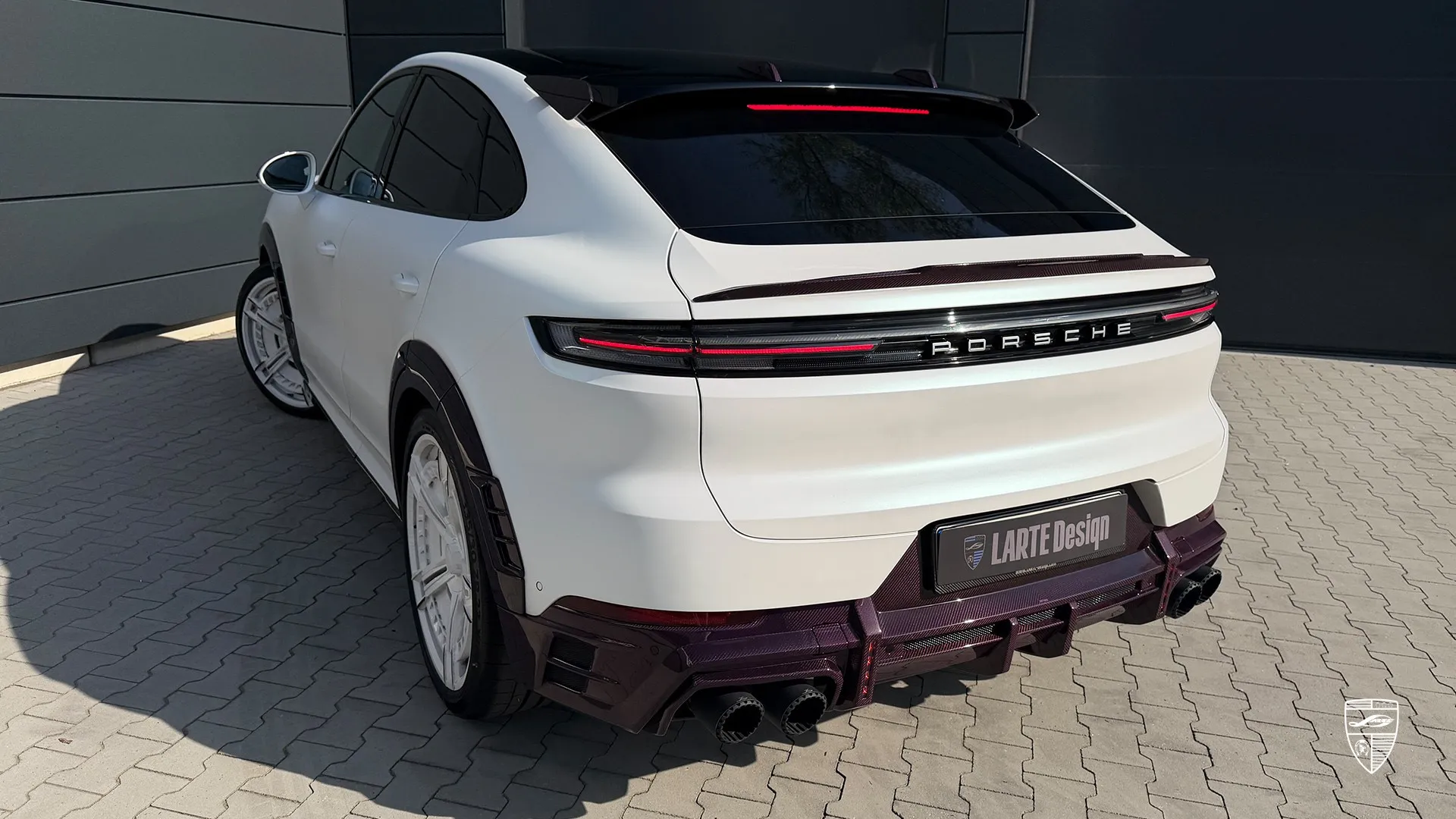 Porsche Cayenne Coupe exterior with rear styling upgrades and custom design elements