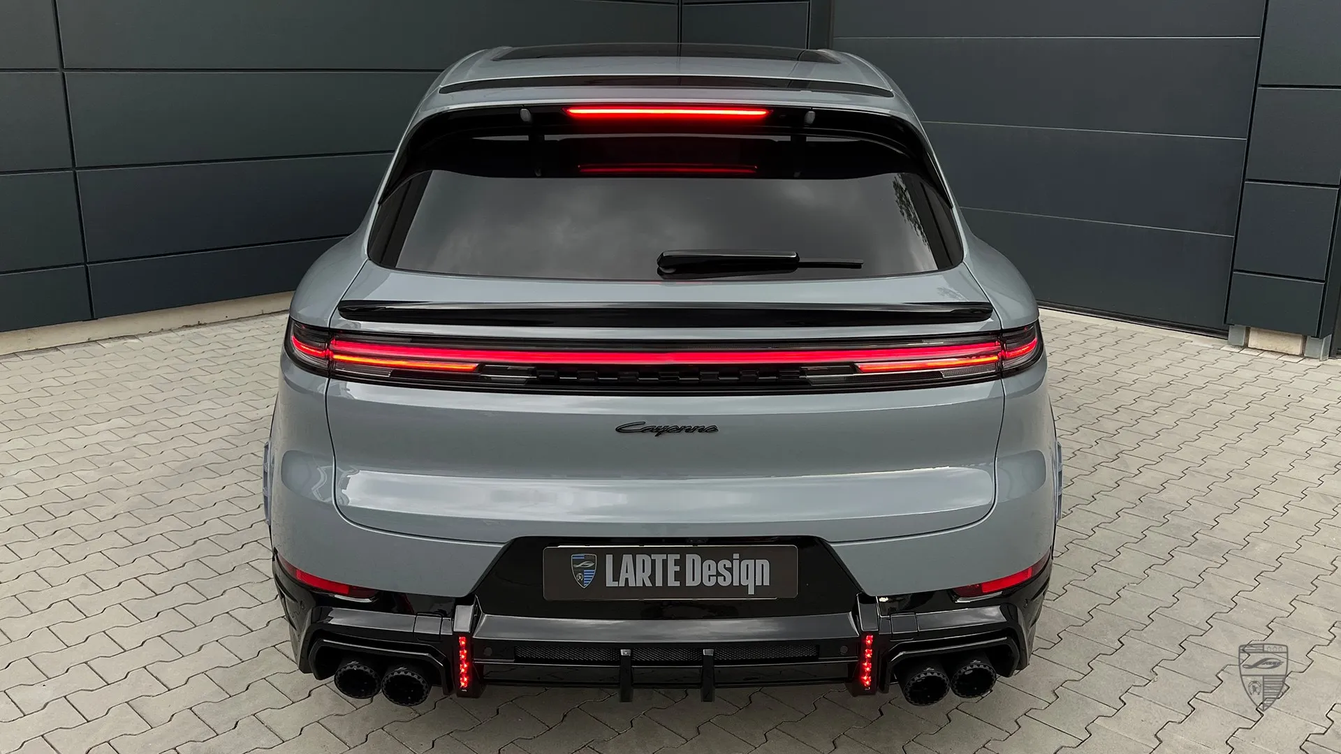 Porsche Cayenne e-hybrid rear view with refined exterior styling and custom upgrades
