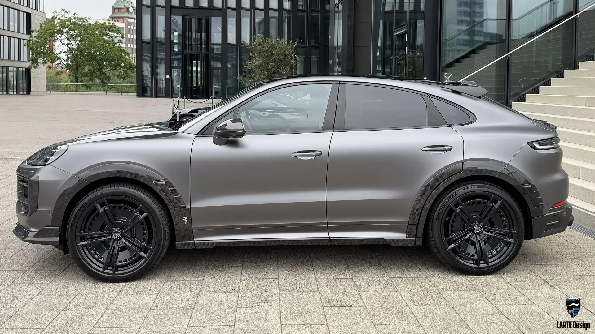 Porsche Cayenne S Coupe with Satin Dark Grey wrap — aggressive style and custom aero package