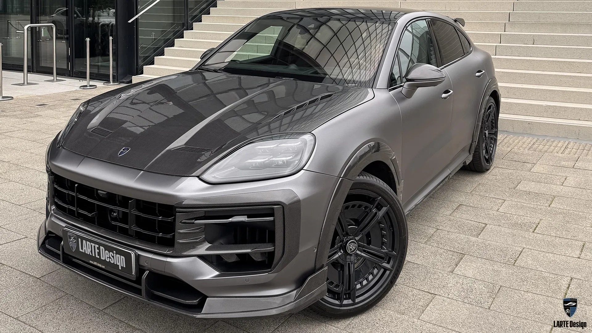 Custom Cayenne S Coupe – Satin Grey SUV with Aero Kit Custom Porsche Cayenne S Coupe at Düsseldorf, Hyatt — luxury SUV with sculpted front bumper