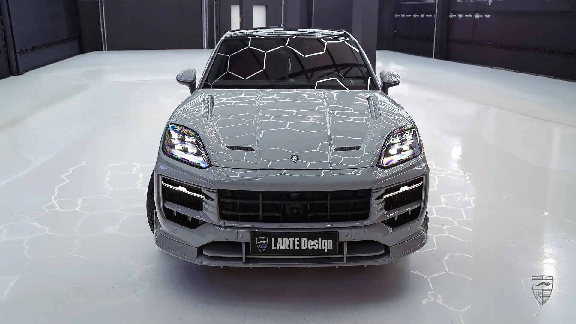 Porsche Cayenne S Coupe in grey with custom and aggressive front styling