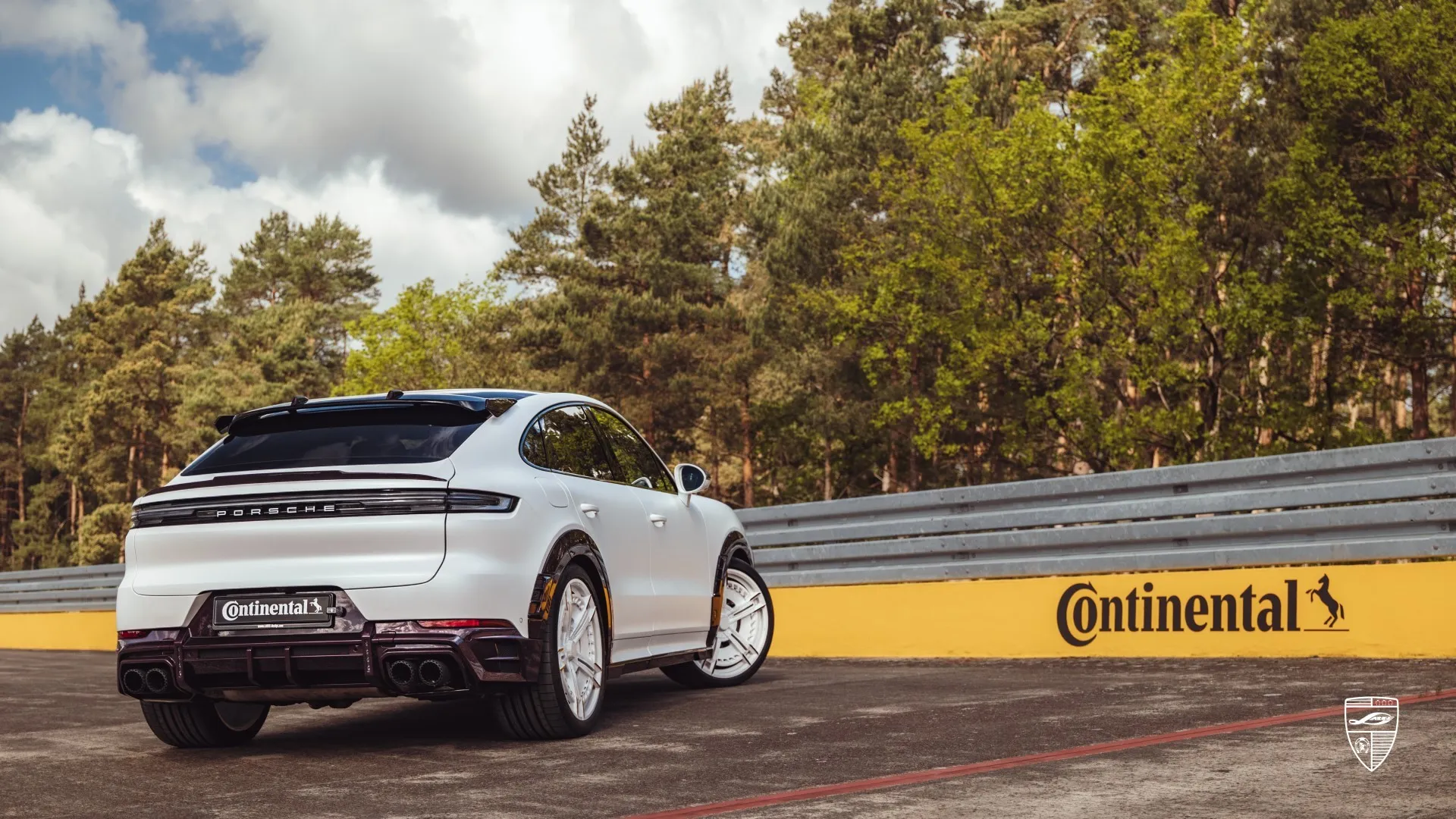 Porsche Cayenne white rear view with premium exterior upgrades and custom styling