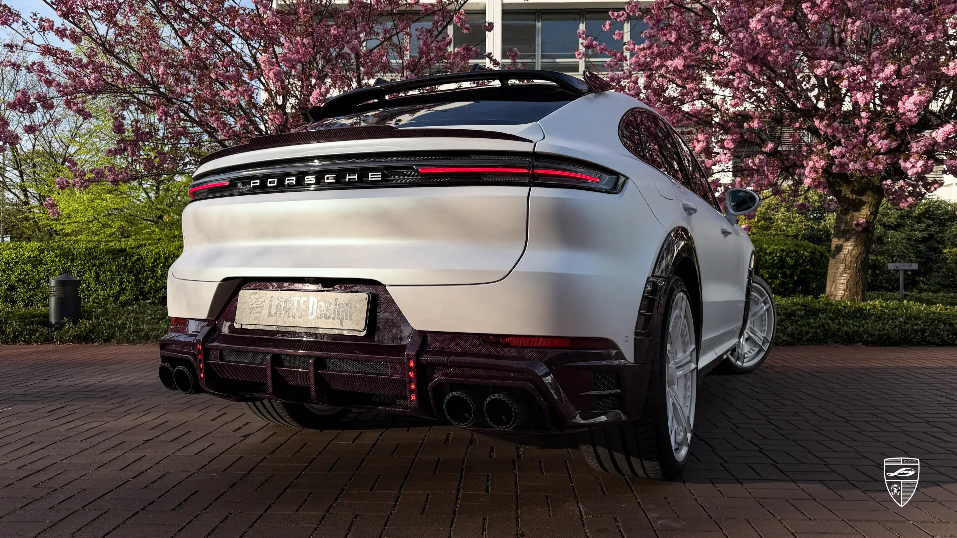 Porsche Cayenne with body kit showing sporty upgrades and wide stance