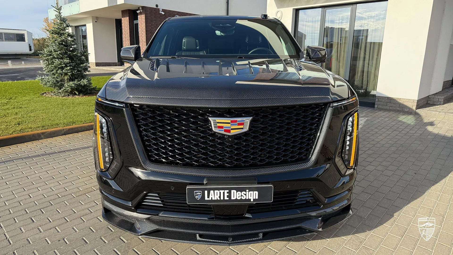 2026 Cadillac Escalade front view with custom grille styling and luxury SUV exterior design