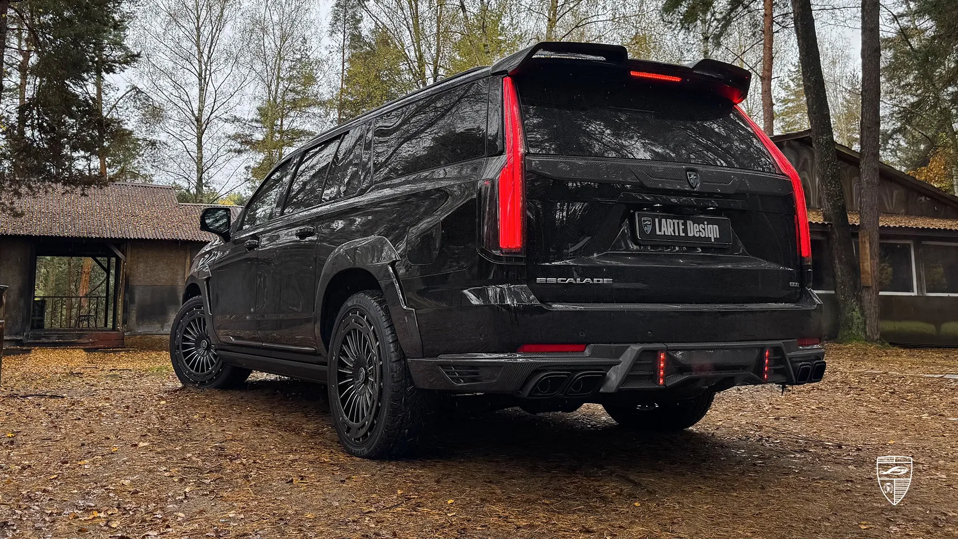 Cadillac Escalade 600 in Raven Black — custom upgrade with widebody kit and bold sporty styling