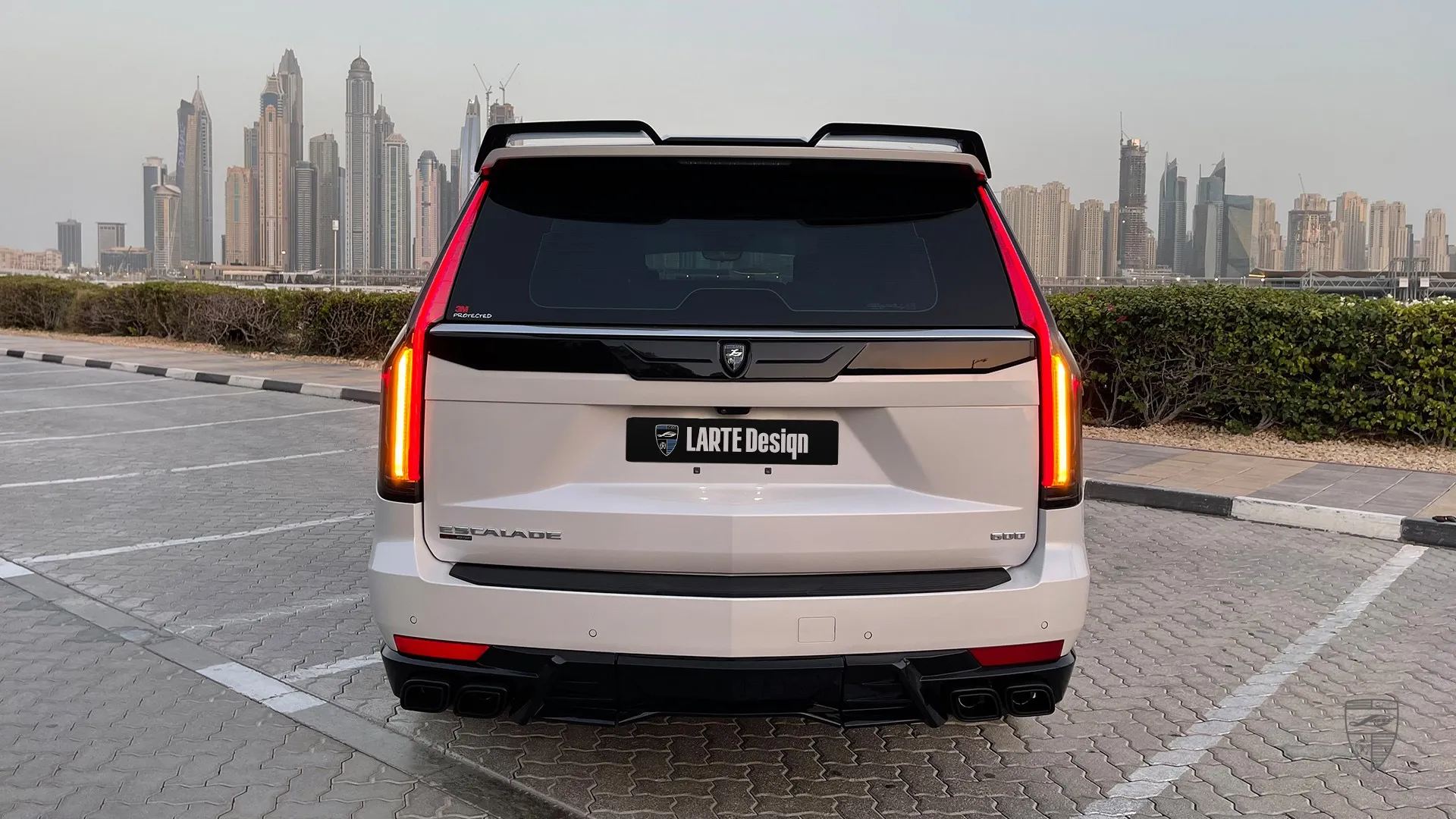 Cadillac Escalade rear view with aggressive styling and premium exterior modifications