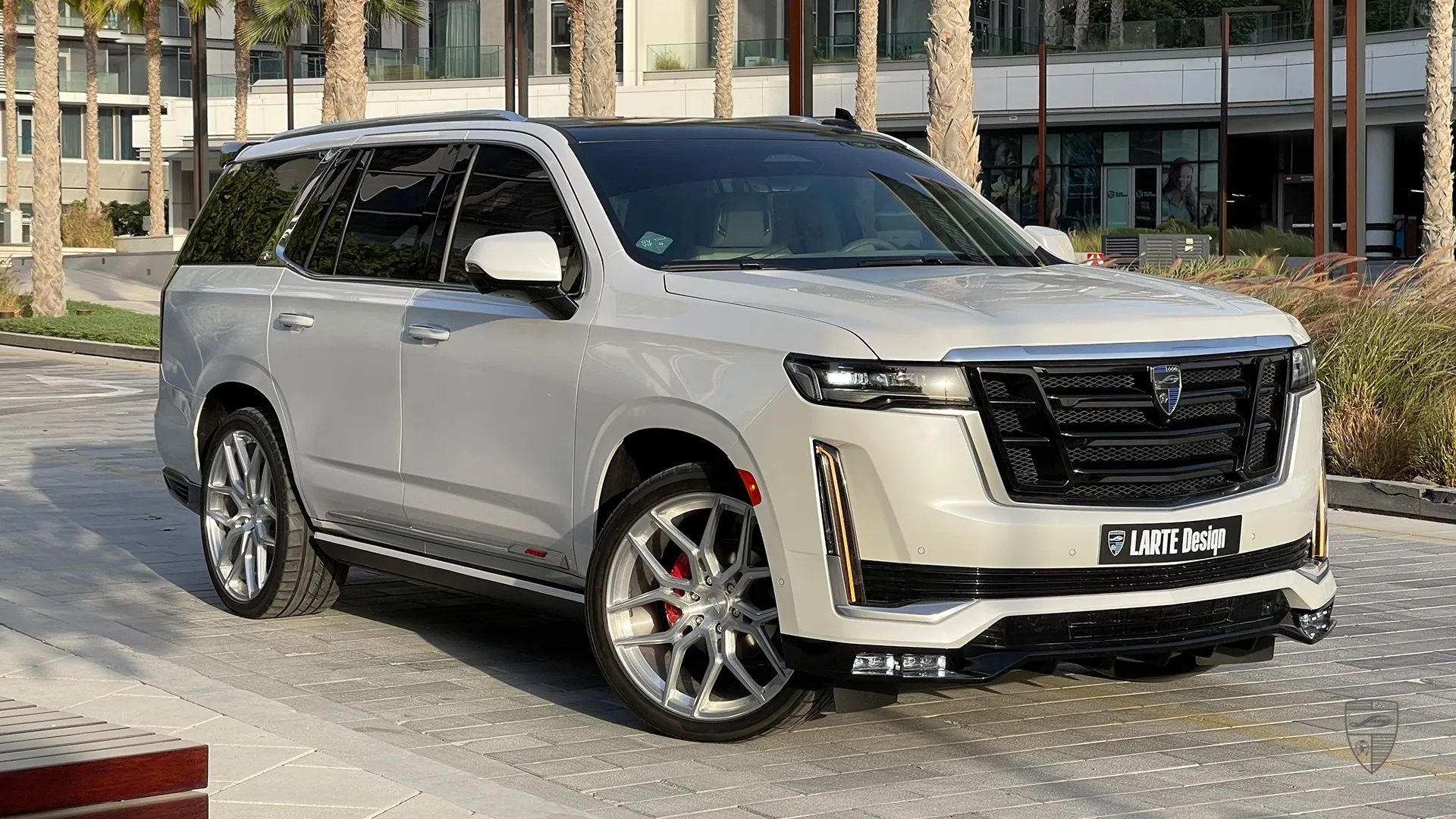 Cadillac Escalade in white with premium custom body kit and exterior styling