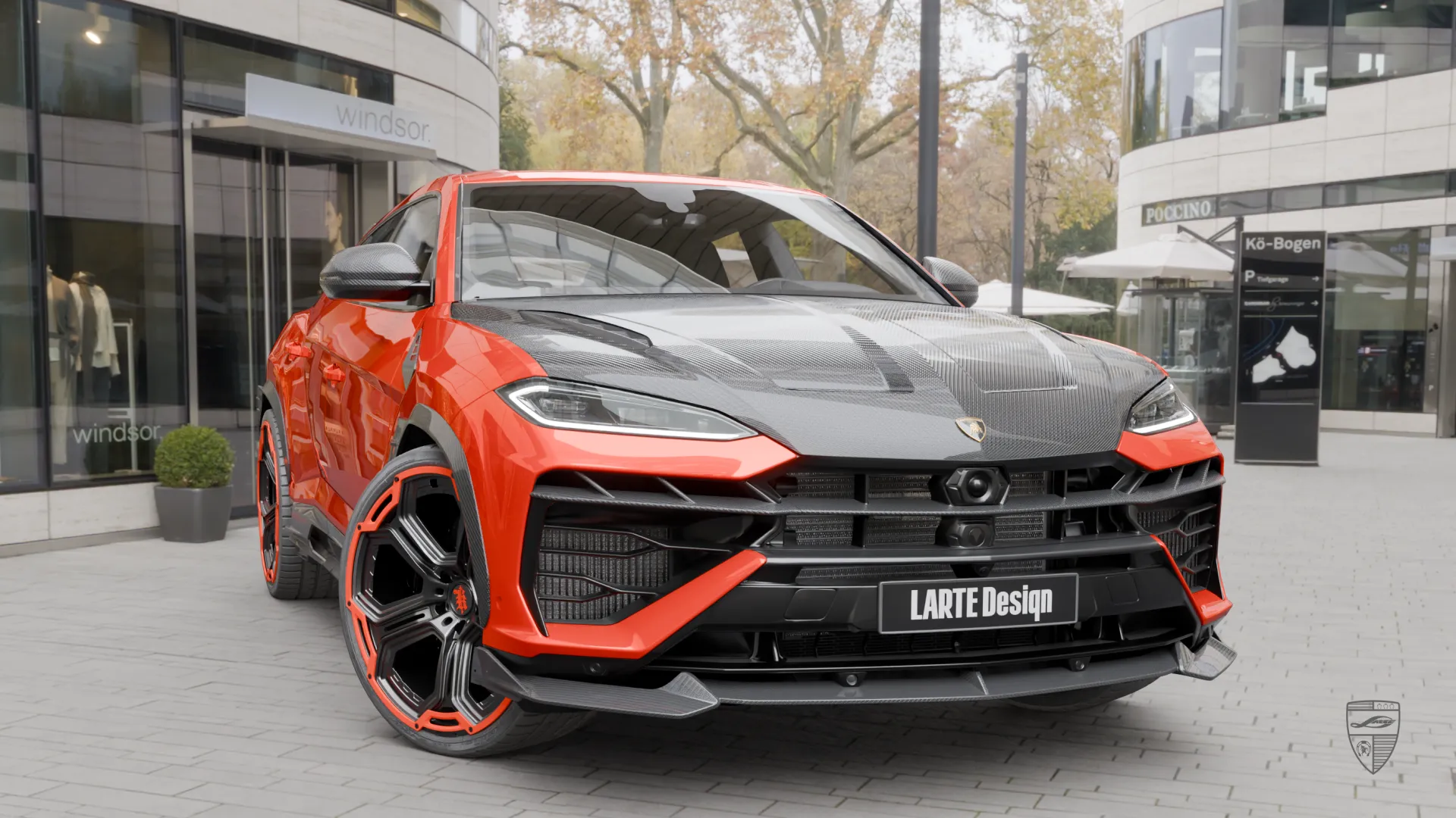 Lamborghini Urus SE orange front close up with carbon fiber details and sharp design elements