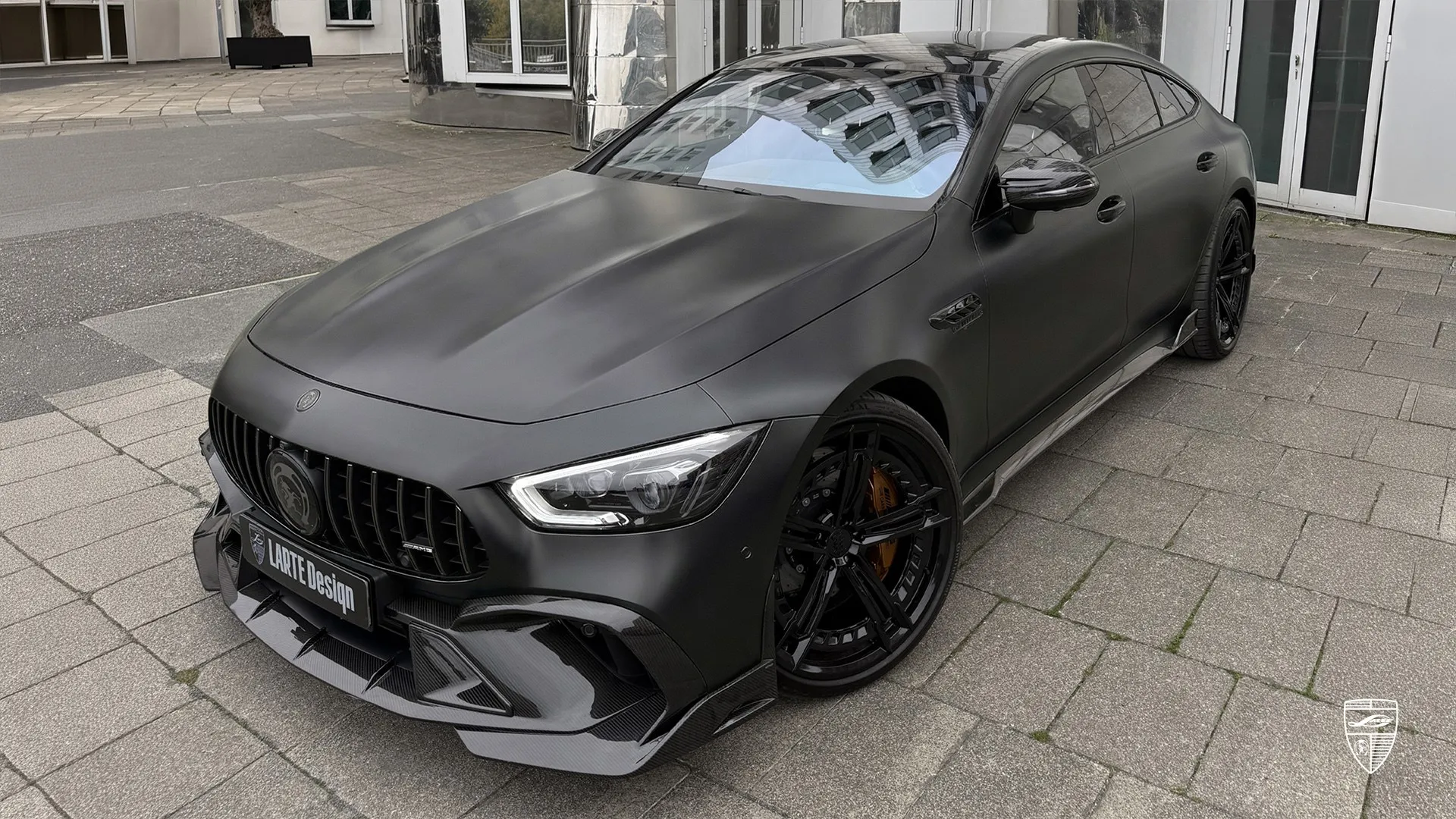AMG GT63 side front view in black matte with body kit and aggressive styling