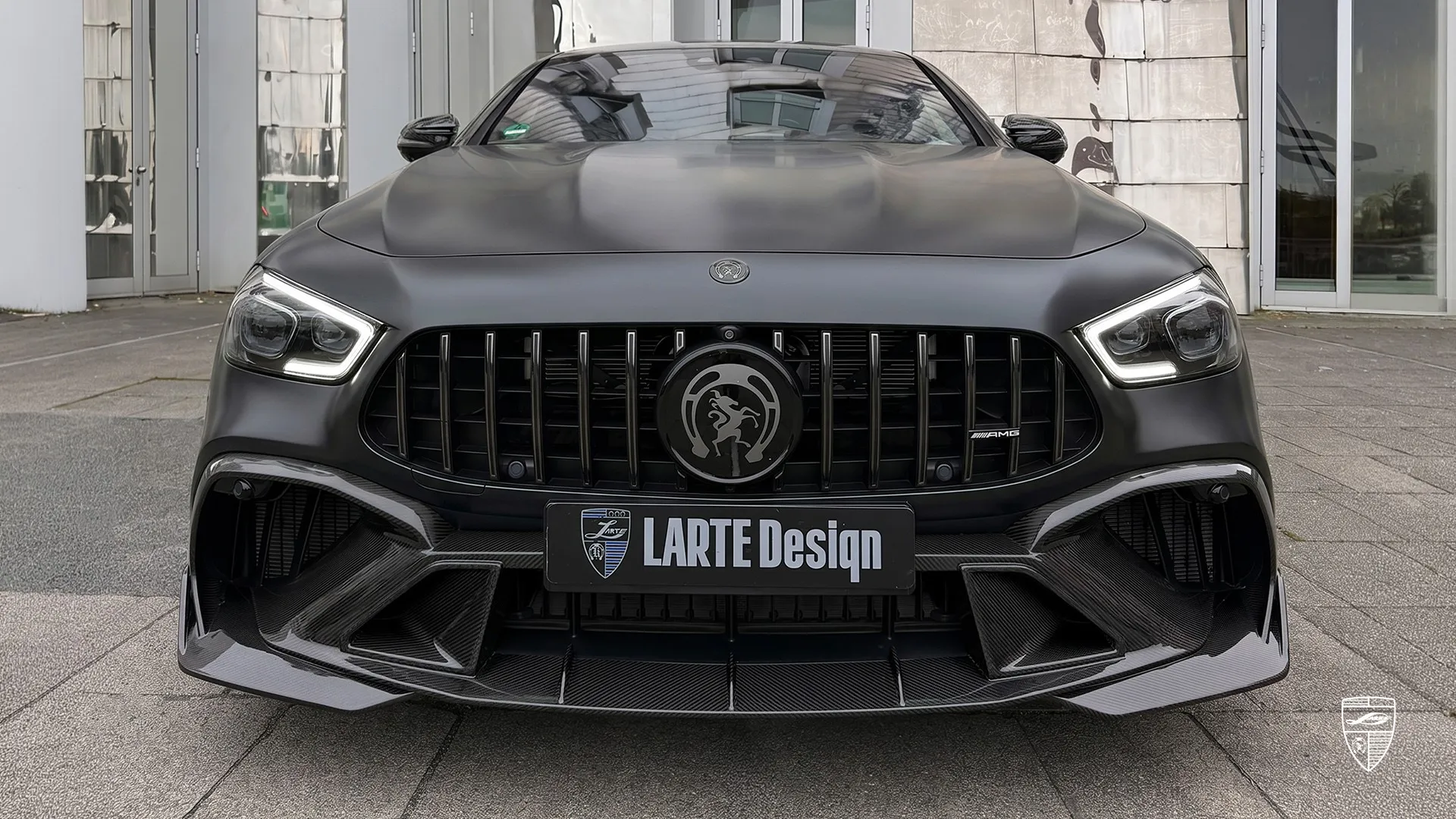 Mercedes-AMG GT 63 front angle in black matte with performance styling and upgrades