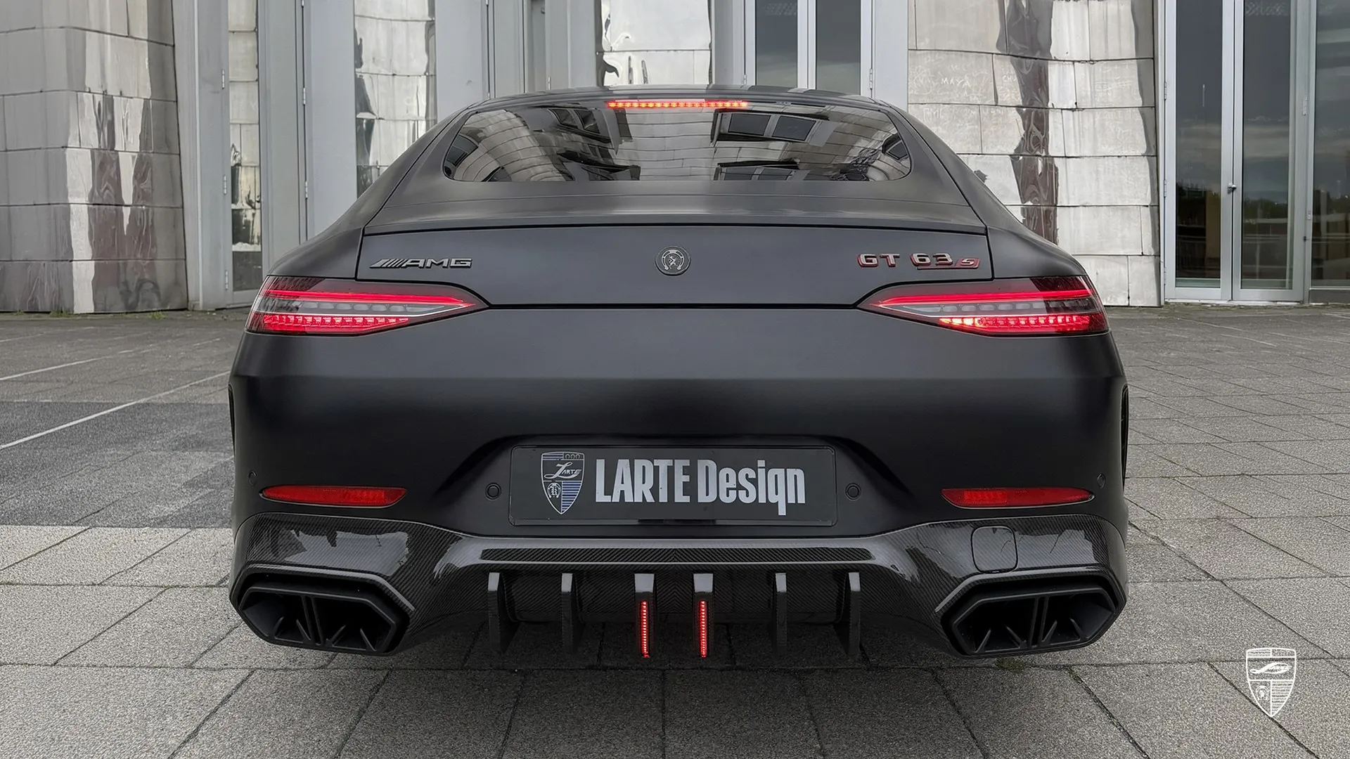 Mercedes GT 63 AMG rear view in black matte with sporty custom styling