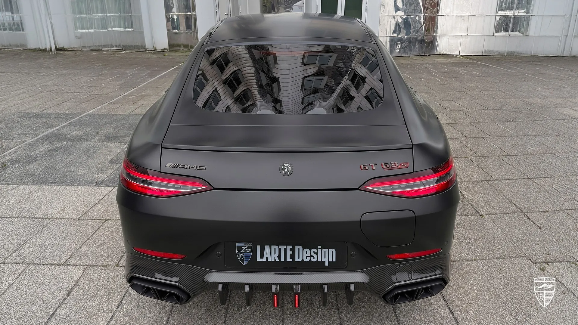 Mercedes GT 63 AMG rear view in black matte with modified exterior styling