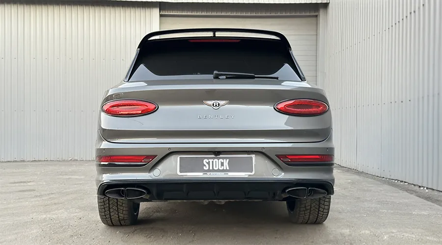 Rear view on a BENTLEY BENTAYGA MLB-2020-2024 with a body kit giving the car a custom appearance