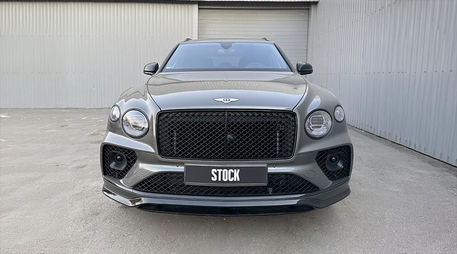 Front view on a BENTLEY BENTAYGA MLB-2020-2024 with a body kit giving the car a custom appearance