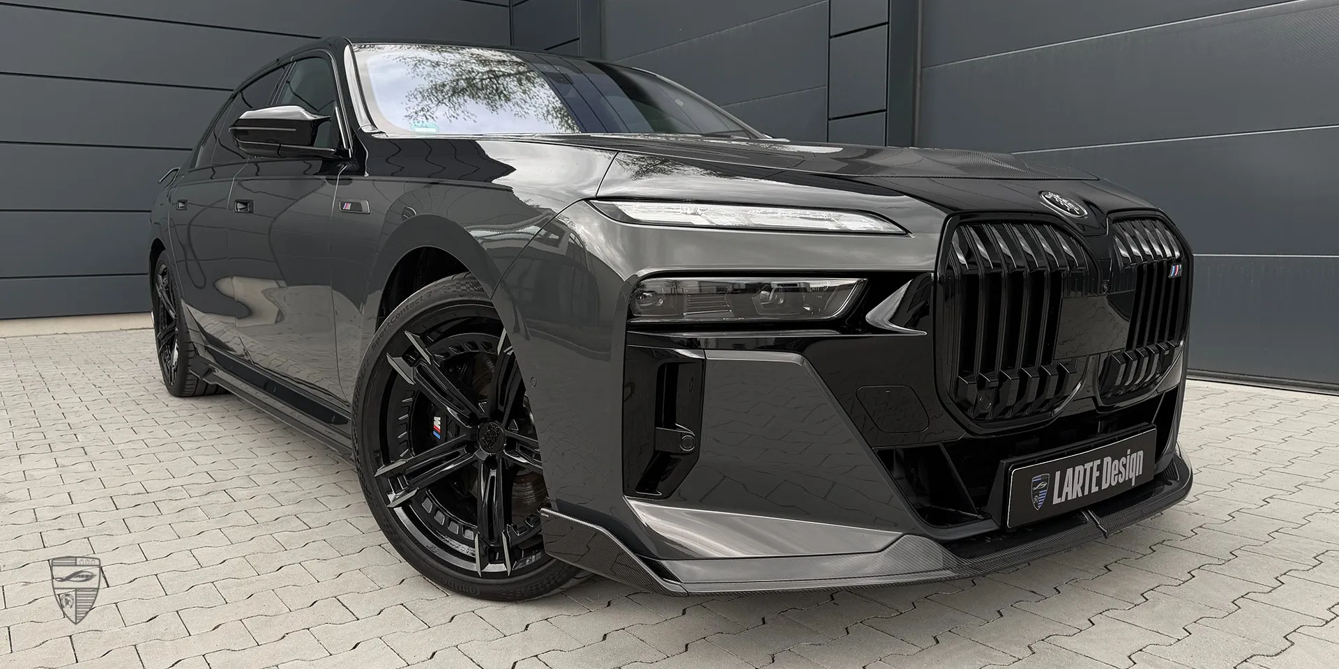 BMW 7 Series aerodynamic package with hood, splitter, side skirts, and diffuser