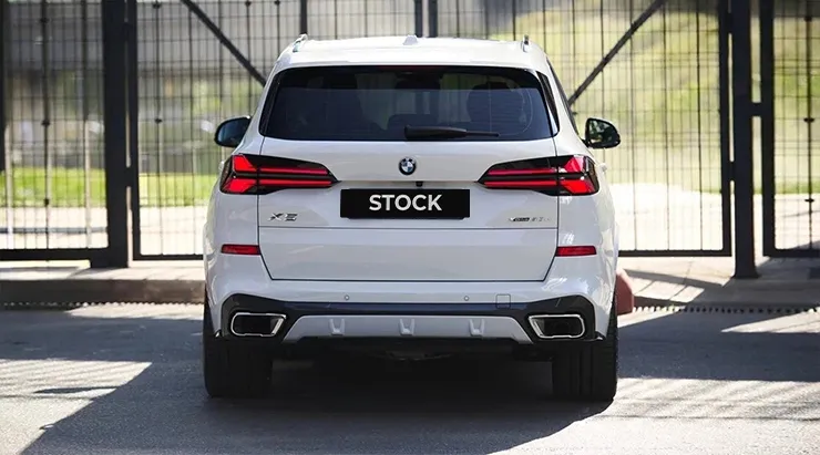 Rear view on a BMW X5 G05 LCI Facelift 2023 with a body kit giving the car a custom appearance