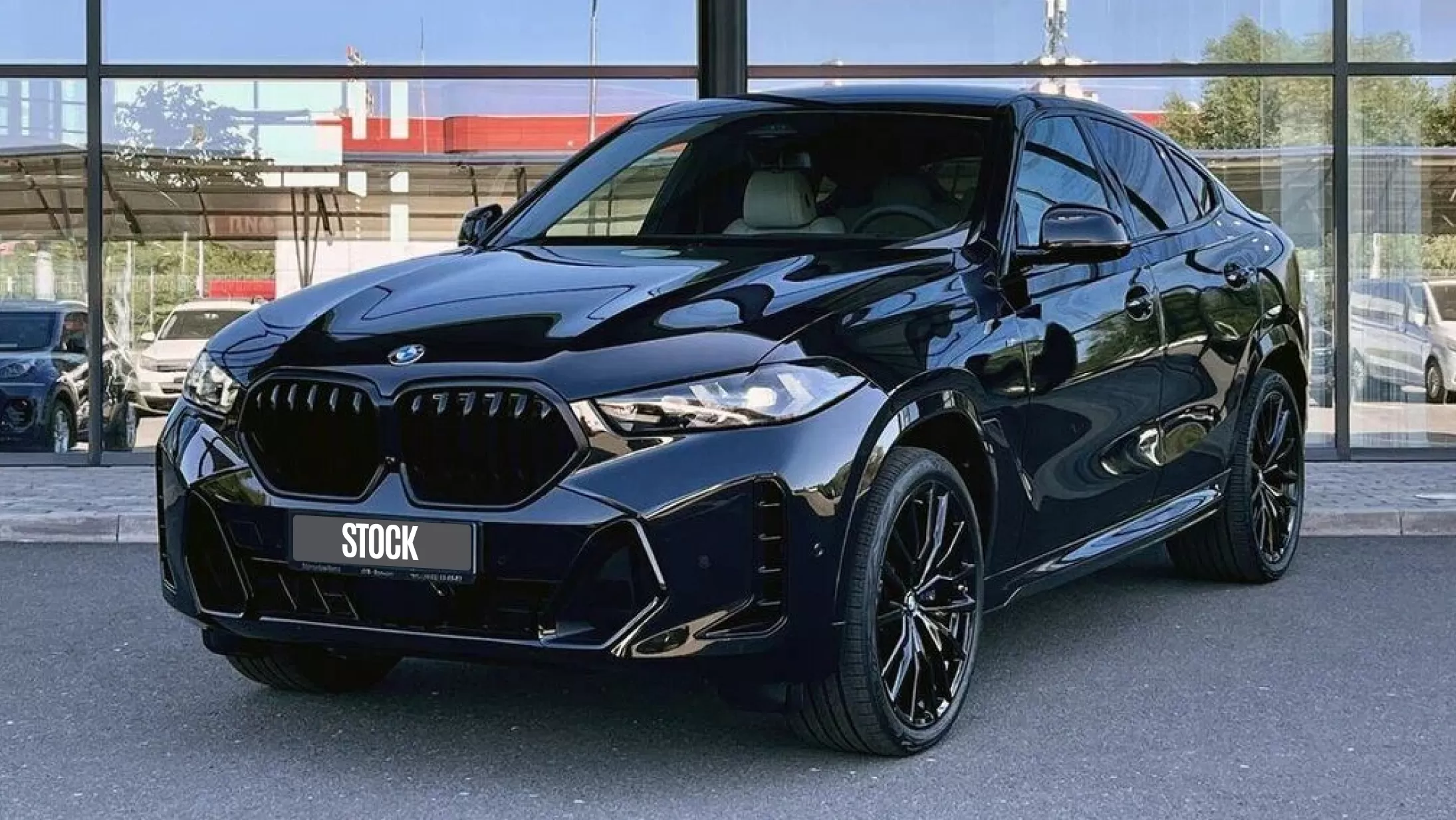 Front angle view on a BMW X6 LCI Facelift with a body kit giving the car a custom appearance