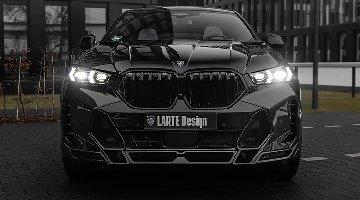 Front view on a BMW X6 LCI Facelift with a body kit giving the car a custom appearance