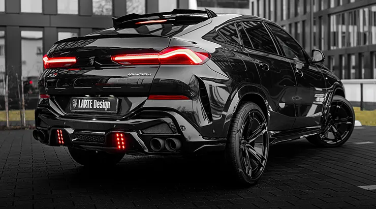 Rear angle view on a BMW X6 LCI Facelift with a body kit giving the car a custom appearance