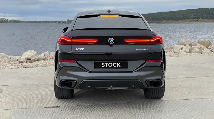 Rear view on a BMW X6 with a body kit giving the car a custom appearance